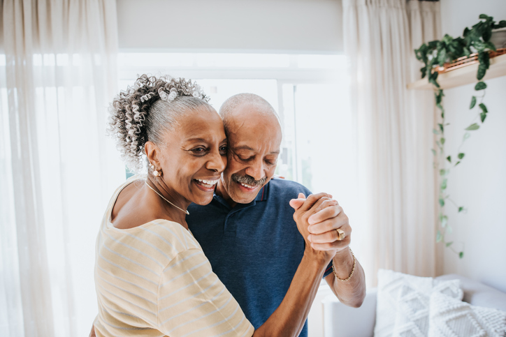 senior couple dancing together